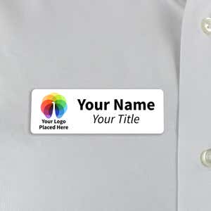 White 1x3  inch name tag - sample template - worn on a off-white dress shirt for size perspective