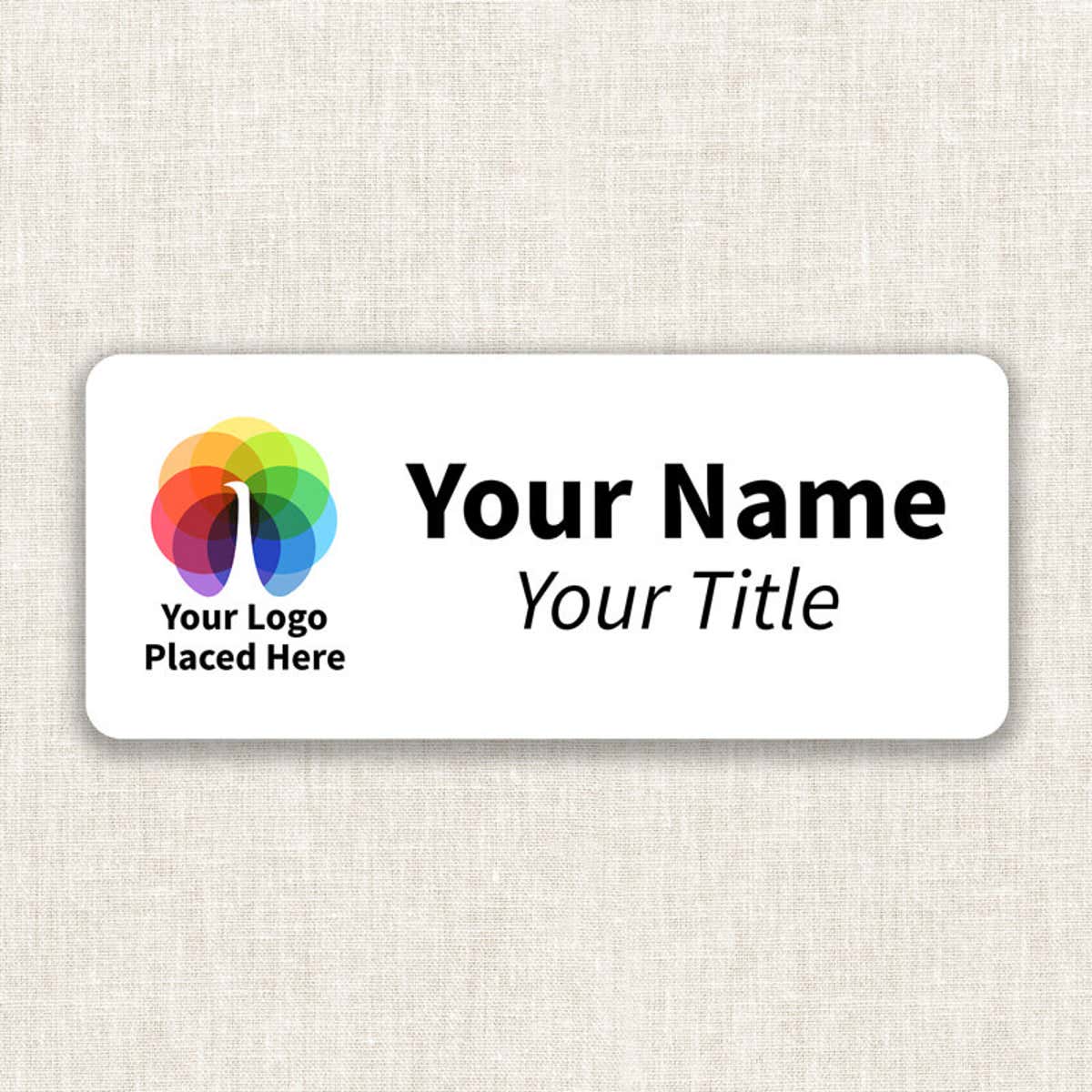 A Full Color Custom Name Tag - 1.25" x 3" on a off-white material background