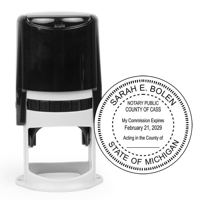 Round notary seal impression example next to stamping tool