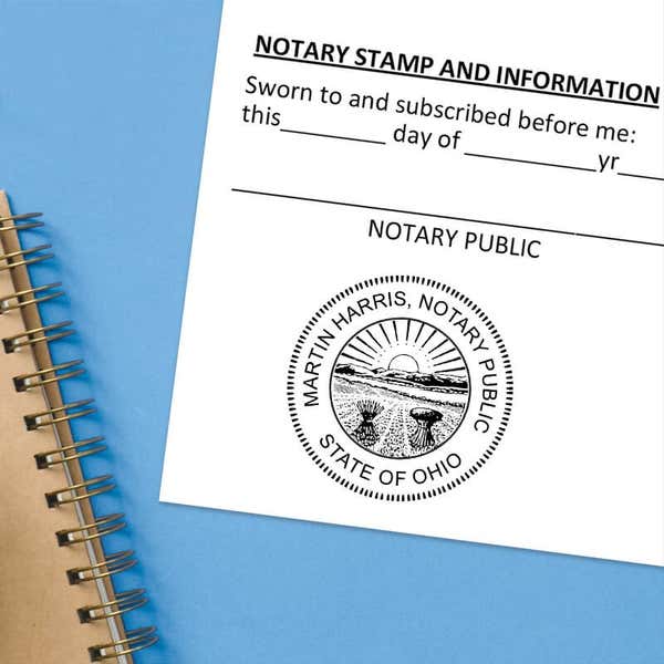 Notary public stamp impression on signed document