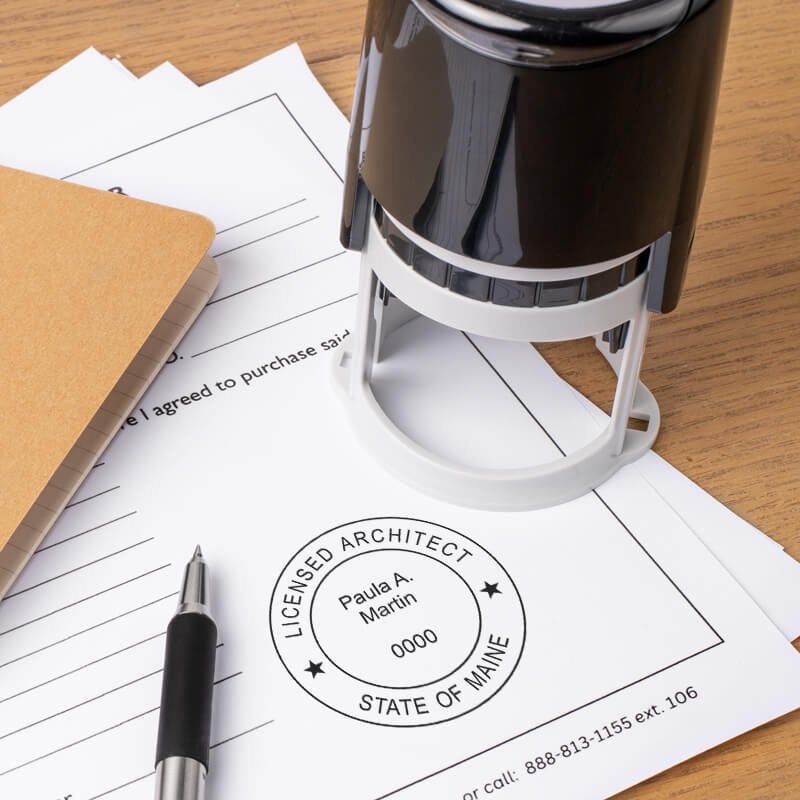 The State of Maine Architect Stamp Seal next to a self-inking stamp
