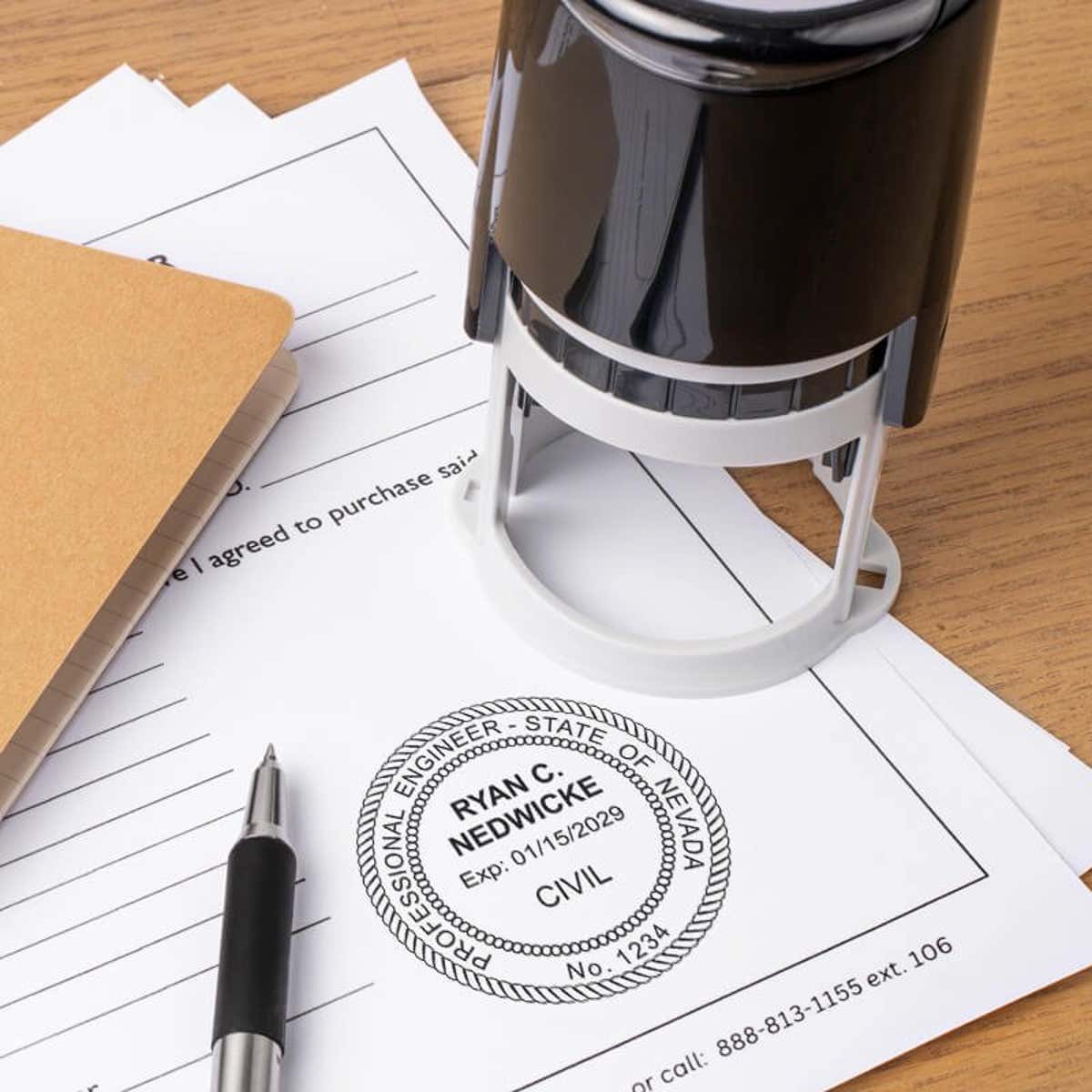 The State of Nevada Engineer Seal on a document next to a self-inking stamp