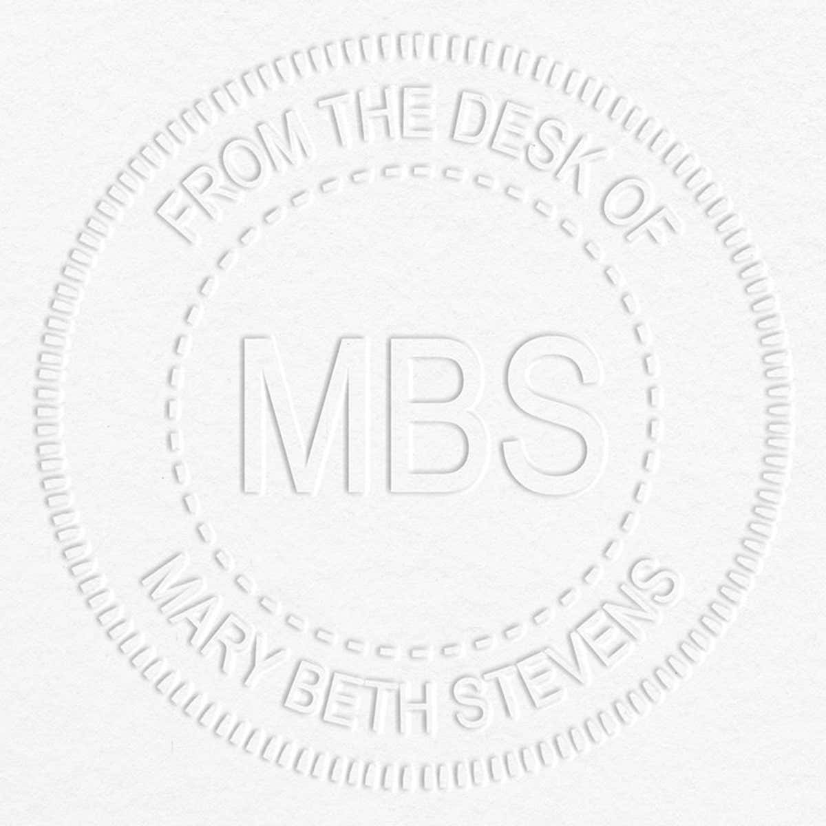 Custom Initial From the Desk of Embosser impression on grey paper