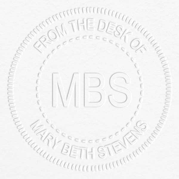 Custom Initial From the Desk of Embosser impression on grey paper