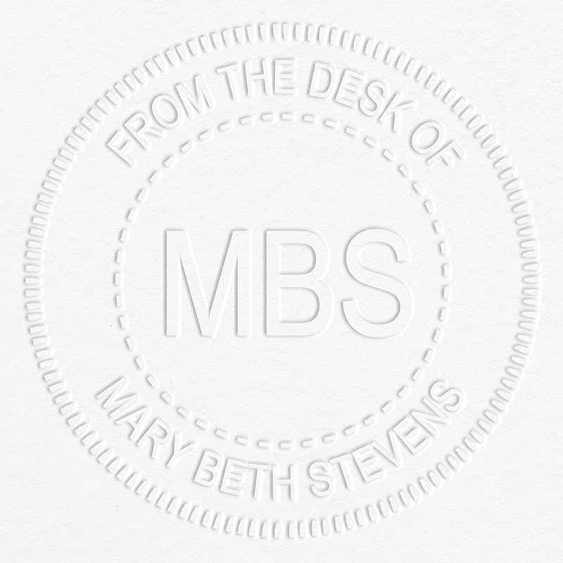 Custom Initial From the Desk of Embosser impression on grey paper