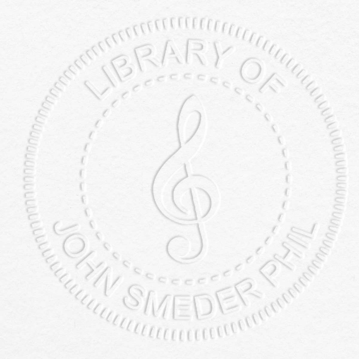 Treble Clef Music Symbol Embosser impression on grey paper