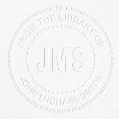 Example of From the Library Initials Personalized Book Embosser Imprint on grey paper