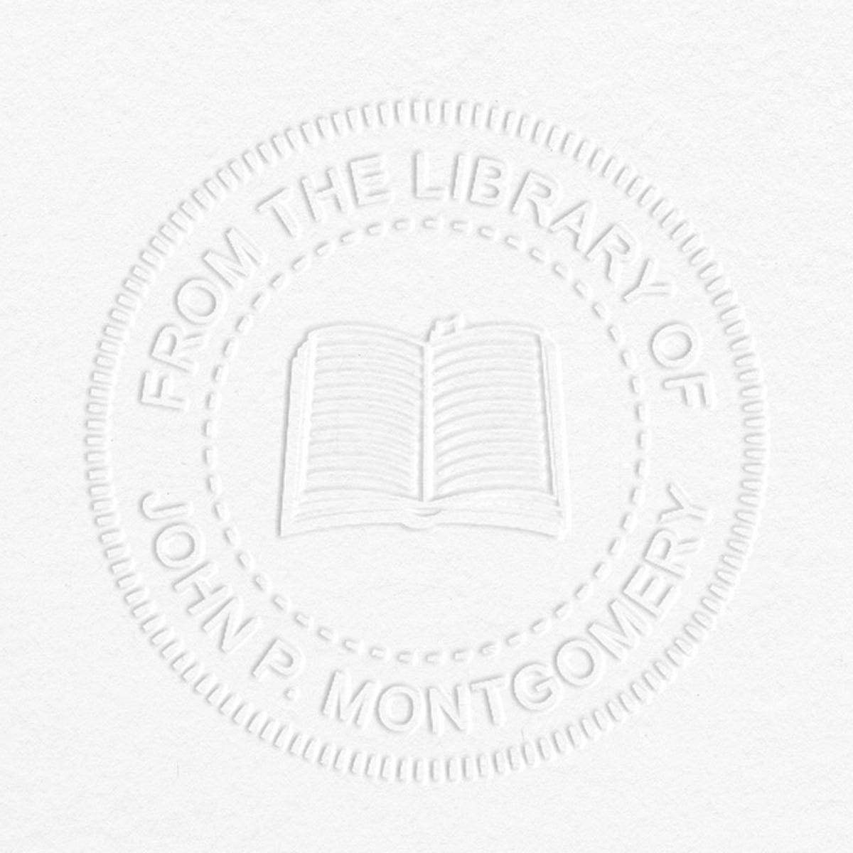 From the Library Book Embosser impression on grey paper