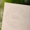 This is what the raised impression left by the LLC Seal Embosser looks like on paper.