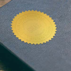 When used with foil stickers, embossers can leave beautiful impressions without damaging books.