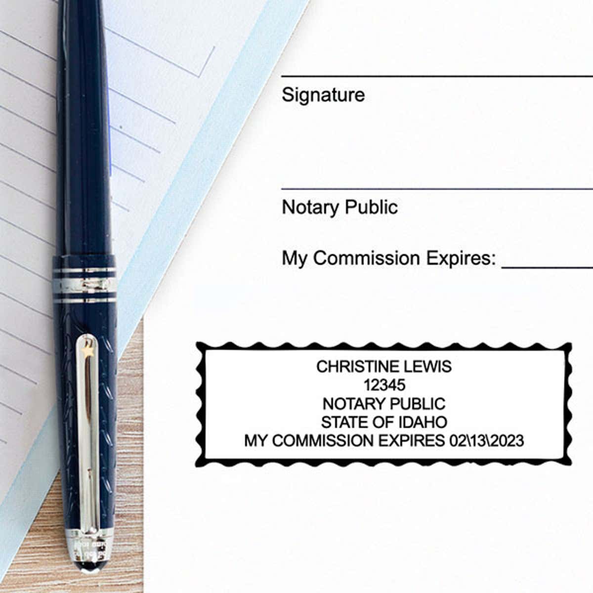 Example of impression next to pen and paper
