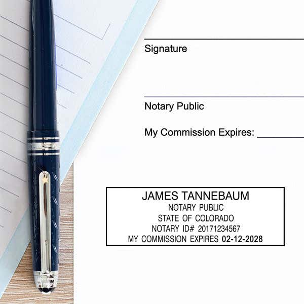Colorado Notary Pink Stamp - Rectangle Impression on Paper