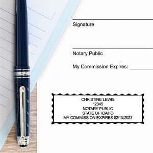Example of impression next to pen and paper