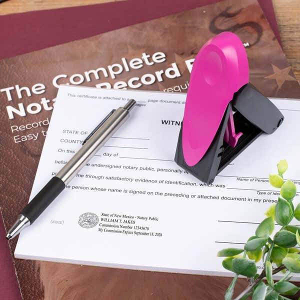 New Mexico Pink Rectangle Notary Pocket Stamp Opened on a Document 