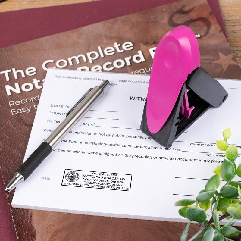 Oregon Notary Pink Stamp Next to Impression on Document