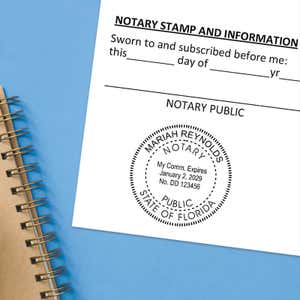 Florida notary seal impression on jurat form with spiral notebook on blue background.