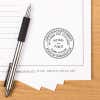 Official document marked with registration-numbered notary stamp