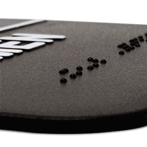 Close up of the Braille on the ADA sign