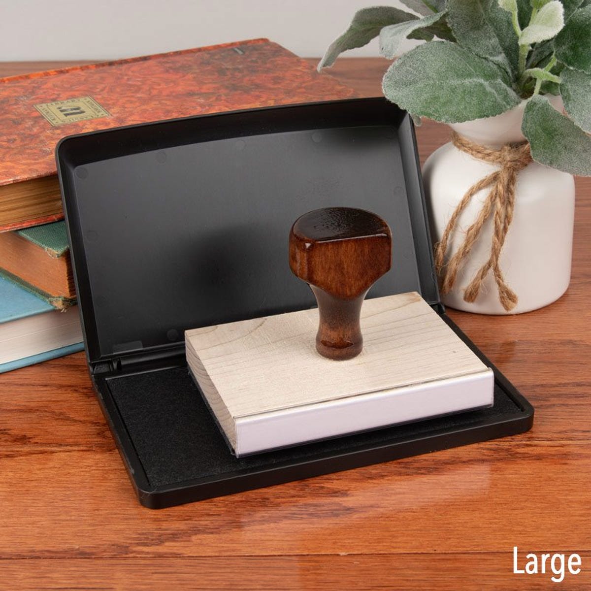 Opened Large Black Ink Pad with Hand Stamp