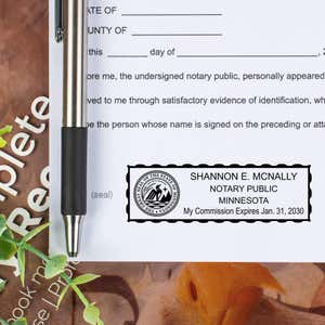 Minnesota Notary Pink Stamp - Rectangle Imprint Example on a document
