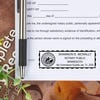 Minnesota Notary Pink Stamp - Rectangle Imprint Example on a document