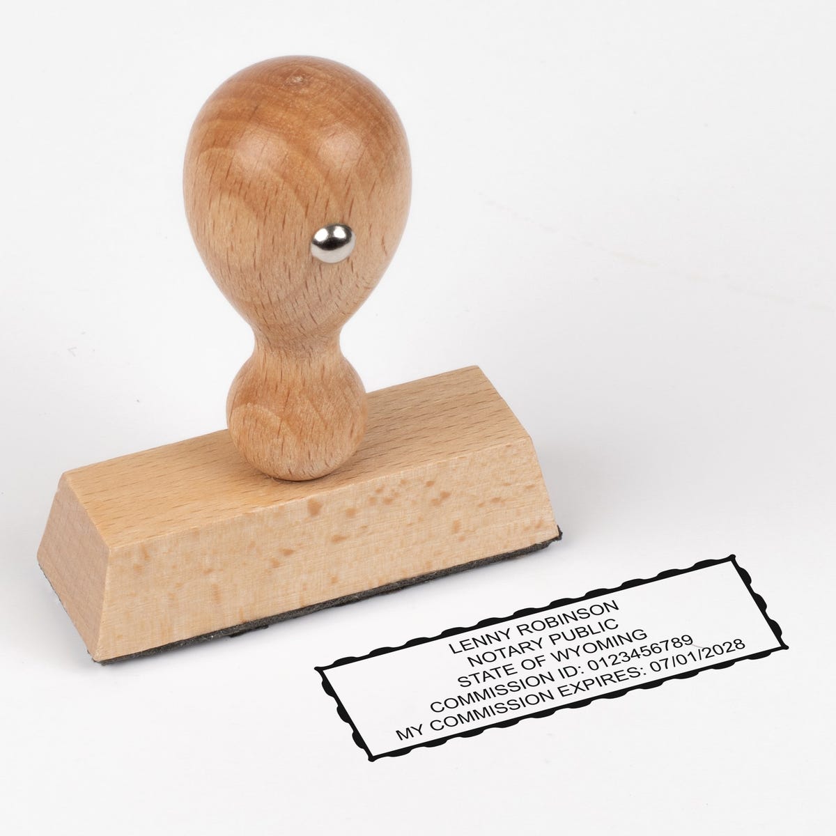 The wood-handled stamp version of the Wyoming Rectangle Notary Seal