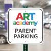 Custom 12”x12” sign that reads Art Academy Parent Parking mounted on green metal post