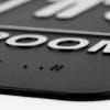 Close up of the Braille on the sign