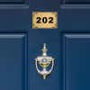 Custom engraved Brass Sign on a Door