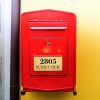 3x6 custom engraved brass sign on a red mailbox