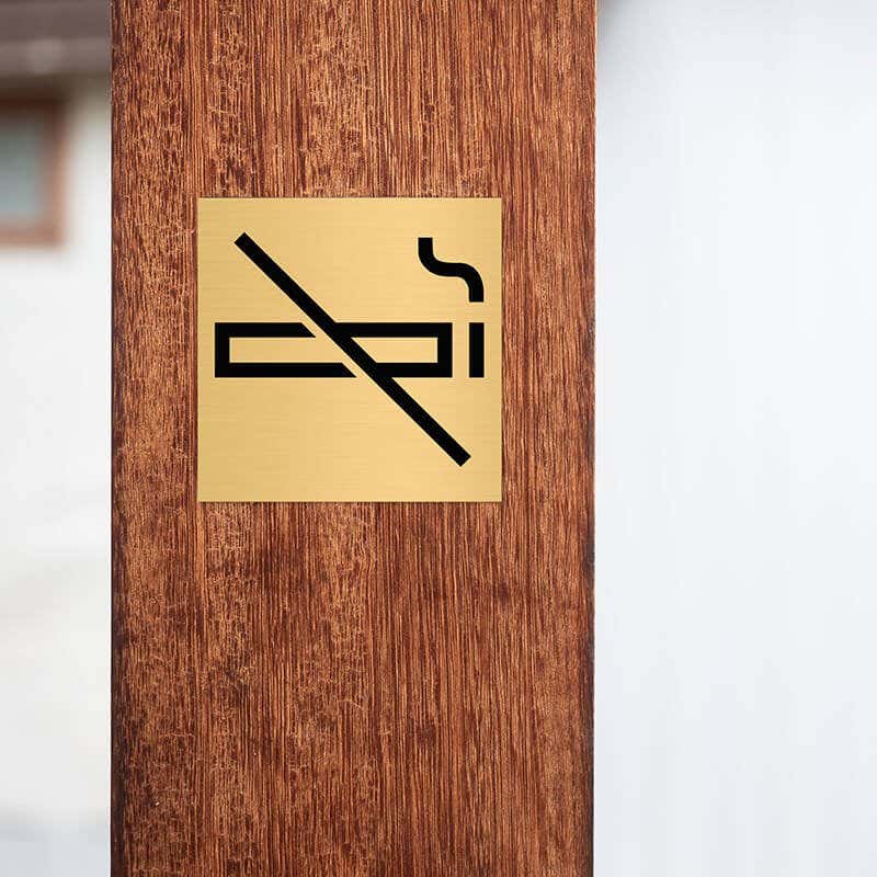 2x2 custom engraved brass sign with a no smoking icon