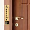 14x3 custom engraved brass sign next to a door