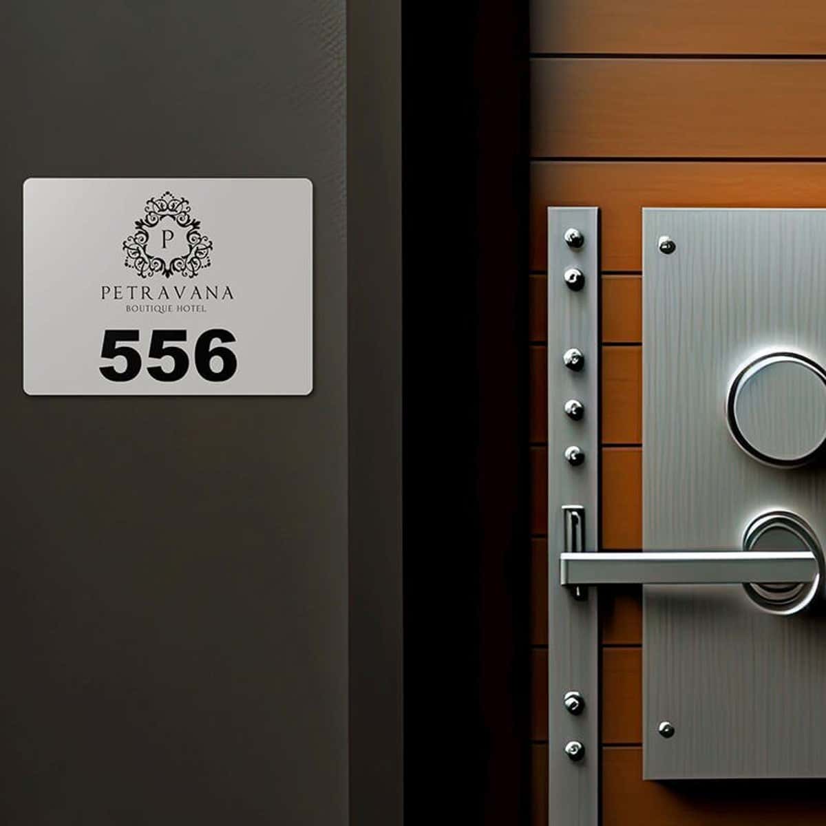 Engraved plastic sign for a room number