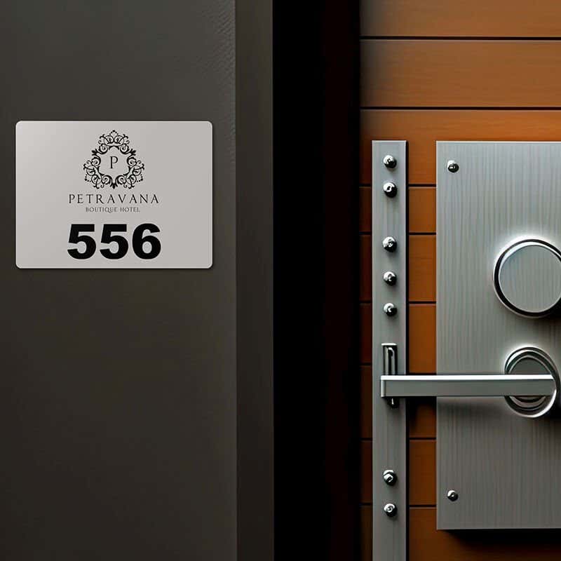 Engraved plastic sign for a room number