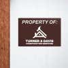 Engraved plastic sign displayed on a wall