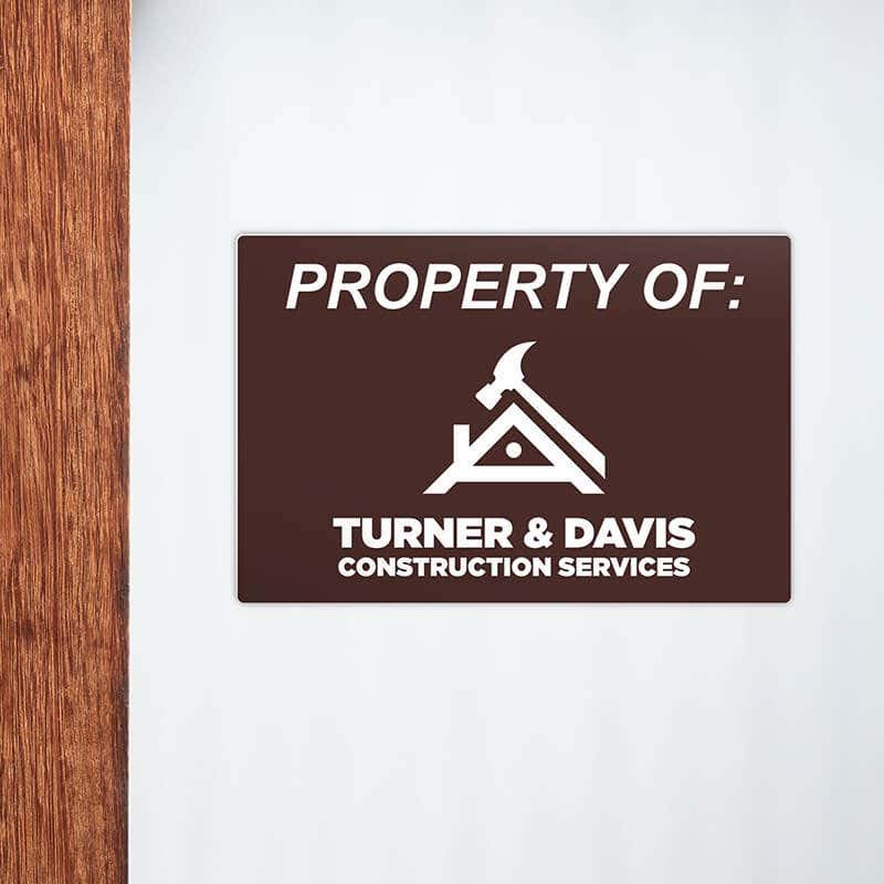 Engraved plastic sign displayed on a wall