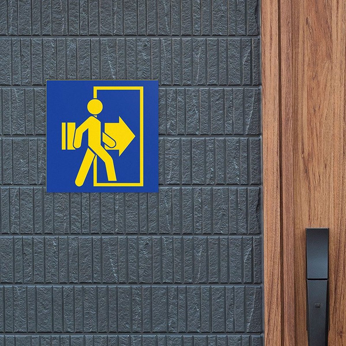 A blue and yellow plastic sign for an exit