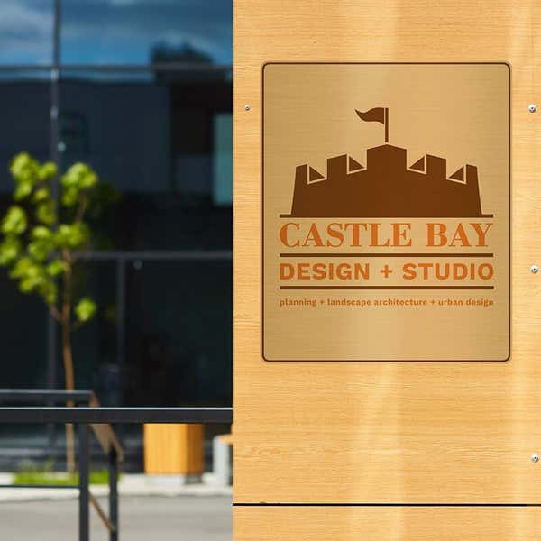 12" x 10" printed brass sign displayed at a front entrance 