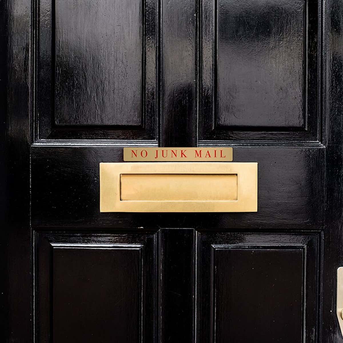 1x8 printed brass sign displayed on a door