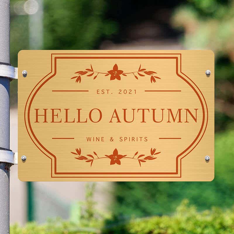 4x6 printed brass sign displayed on a pole
