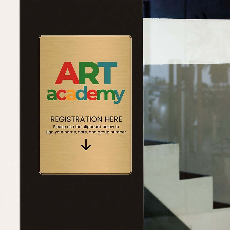 6x4 printed brass sign displayed by a doorway