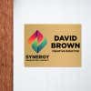 6x8 printed brass sign displayed next to a doorway