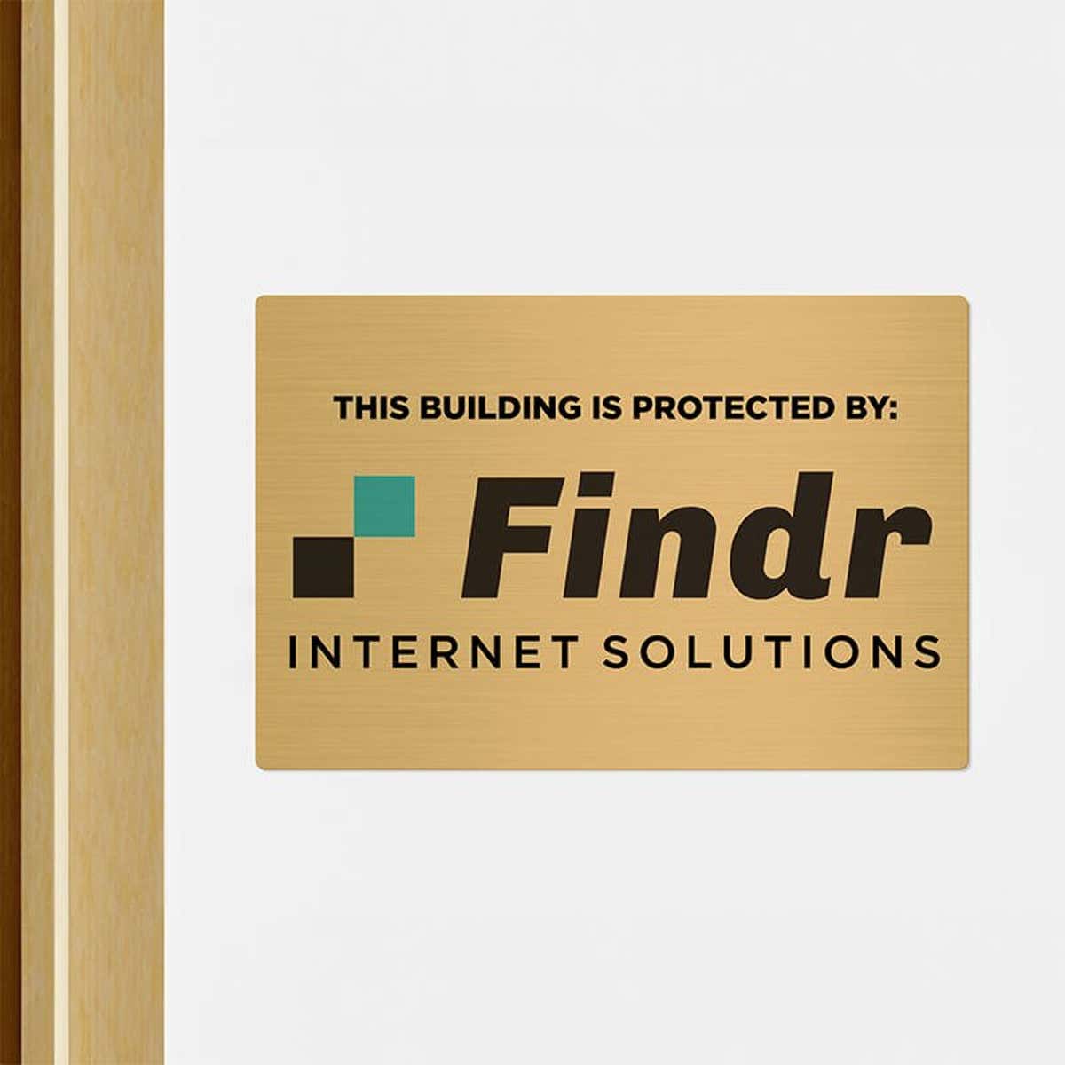 8x12 printed brass sign displayed by a doorway