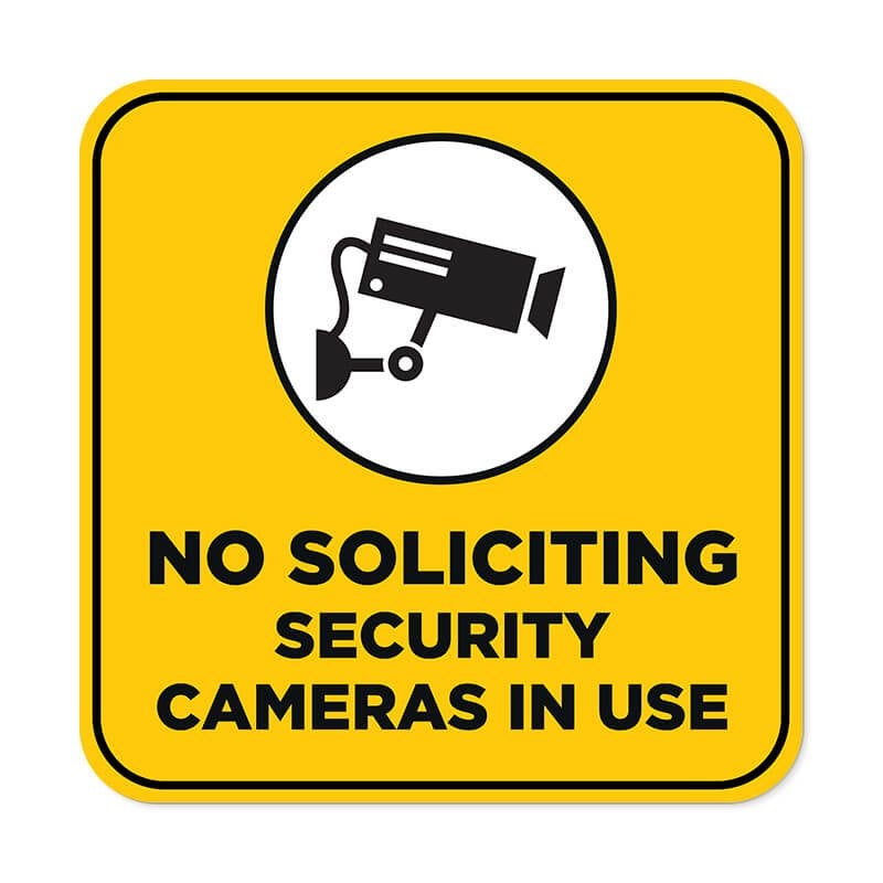 Yellow No Soliciting sign reading "Security Cameras in Use" with a security camera icon