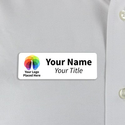 A Full Color Custom Name Tag - 1" x 3" on a off-white material background