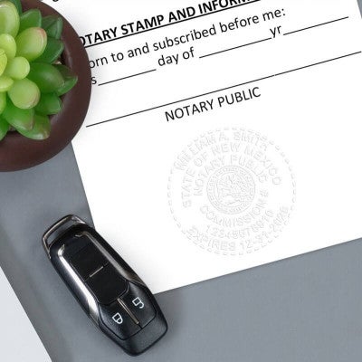 An Embosser and Embosser Impression on a Document