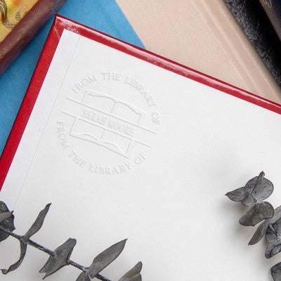 Example of From the Library Book Name Embosser impression on the inside of a book