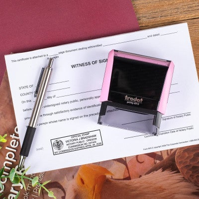 Oregon Notary Pink Stamp Body Next to Stamp Impression on a notary document