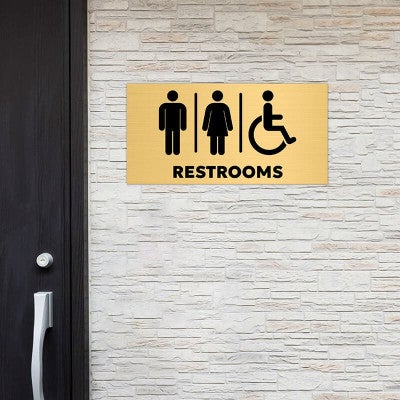 6x12 custom engraved brass sign displayed by a window