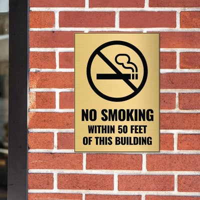 14x10 engraved brass sign on a brick wall